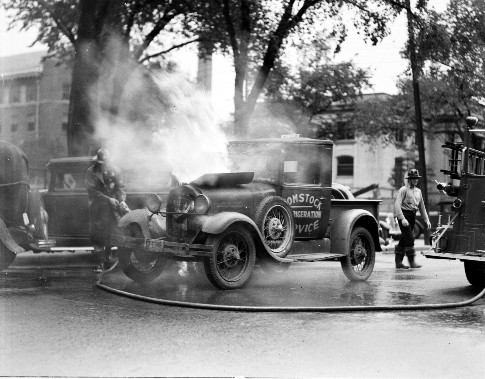 Truck on fire in front of Globe Bldg.jpg